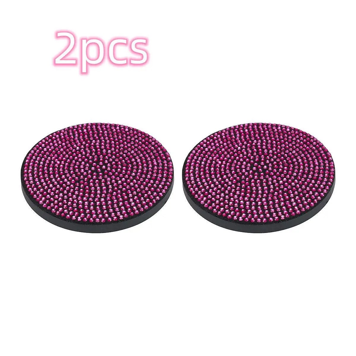 A set of two imitation diamond car cup coasters with a textured magenta surface.