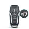 A black smart key shell replacement case with various buttons and a magnified view of the 2x function.