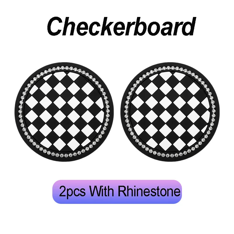 Two black and white checkered coasters with rhinestone borders