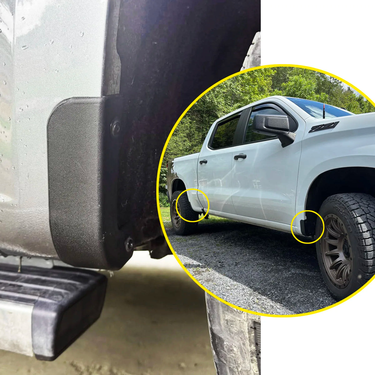 Close-up of black mud flaps installed on the rear bumper of a white pickup truck.