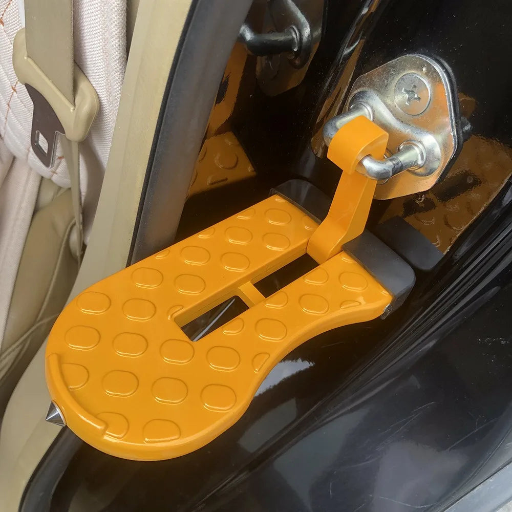 An orange heavy-duty vehicle roof access hook is shown attached to a black vehicle door frame.