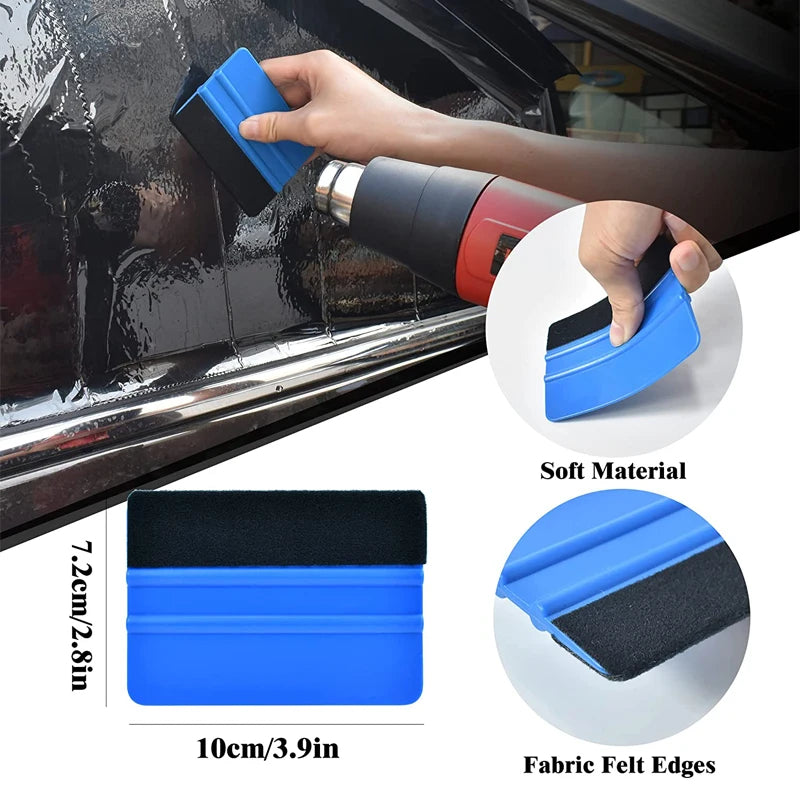 A hand uses a professional car window tinting tool to apply a soft fabric felt edge to a glass surface.