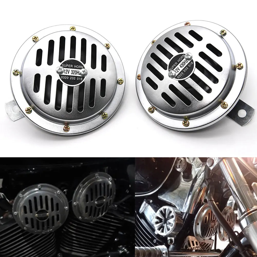 Two silver electric air horn units mounted on a vehicle grille.