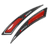 Black carbon fiber car wheel eyebrow protector trim with a red accent.