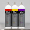 Three bottles of Heavy Cut, Fine Cut, and Micro Cut car paint correction compounds with white caps.