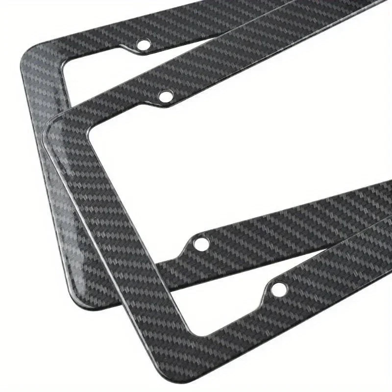 Black carbon fiber license plate frame with mounting hardware