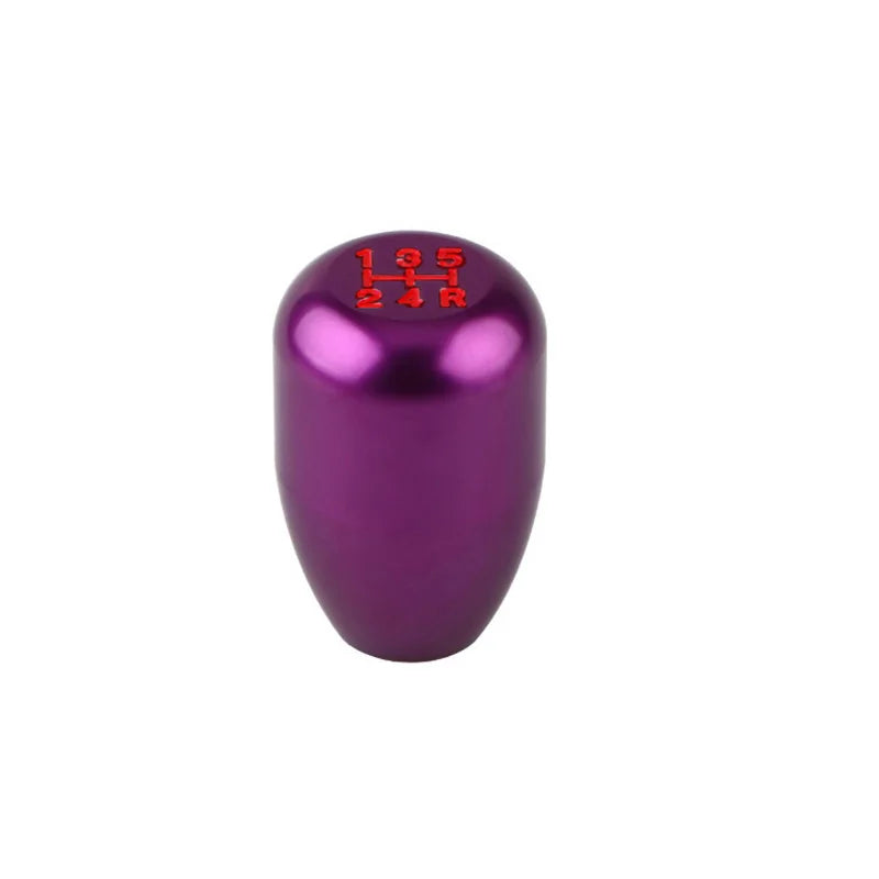 A purple universal aluminum gear shift knob with markings 1, 3, 5, 2, 4, and R.
