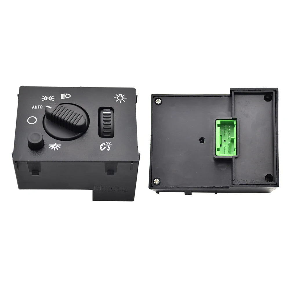 Black aftermarket fog light switch unit with an auto mode selector and a green connector.