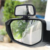 Miroir convexe monté sur un véhicule, offrant une vue large pour la sécurité.