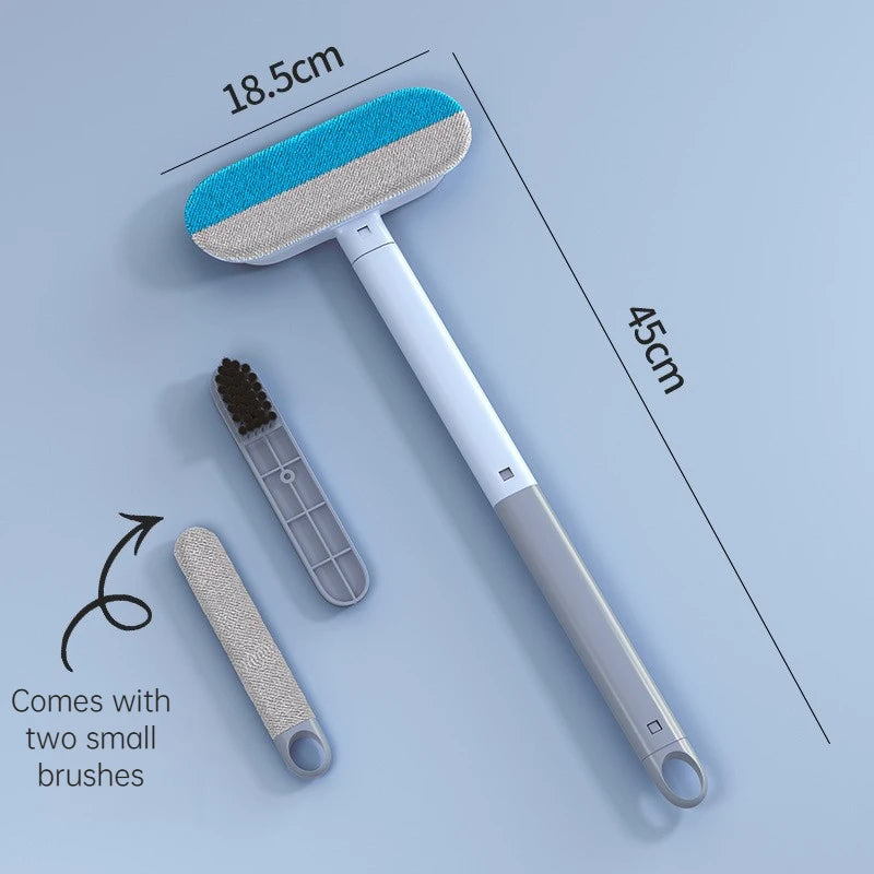 A long-handled static pet hair remover brush with a blue and gray head and two small brushes.
