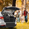 A white SUV's trunk is open showing a black waterproof pet trunk liner installed.