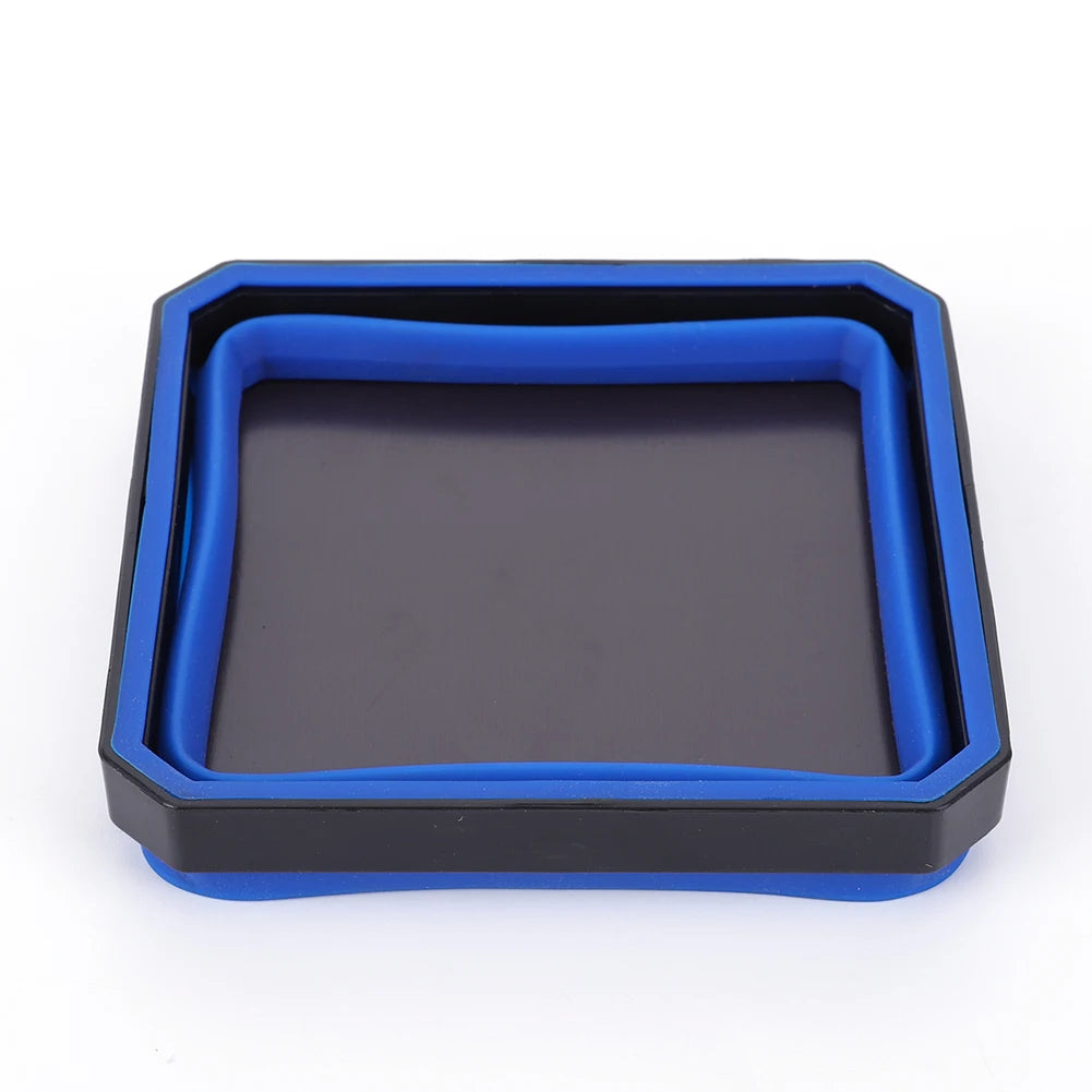 A blue and black collapsible magnetic parts tray organizer with a square compartment.