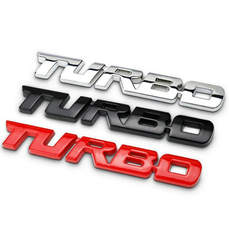 A set of three 3D metal alloy turbo badges in silver, black, and red.