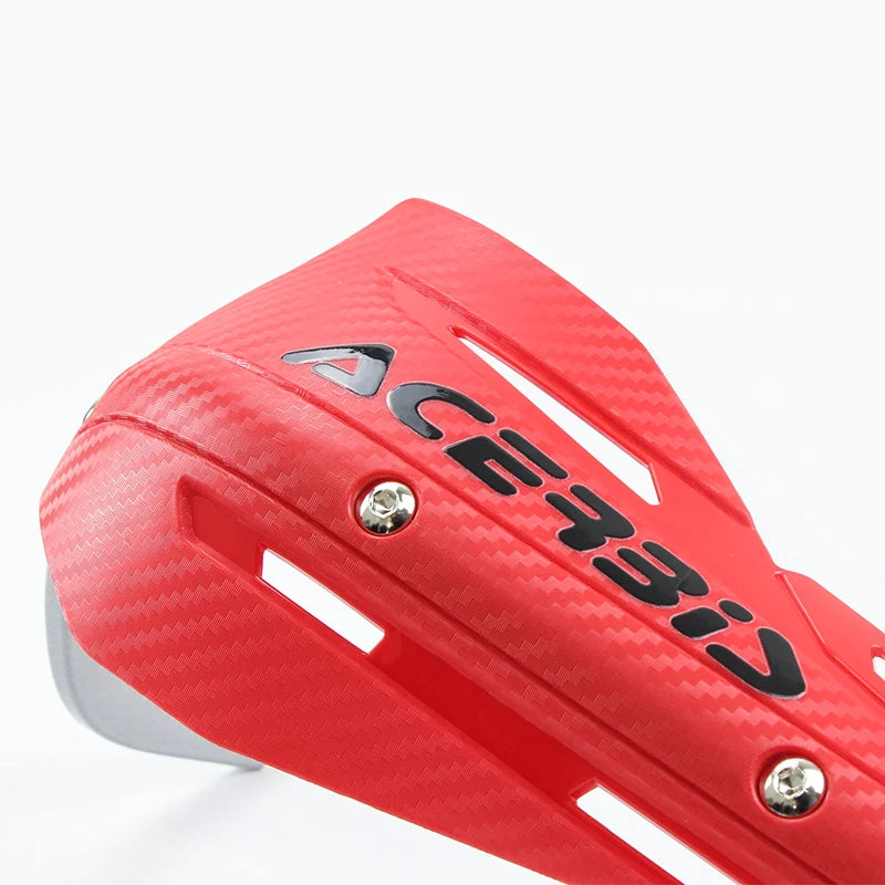 A red motorcycle handguard protector for dirt bikes shown in a close-up view.