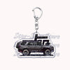 Silver acrylic keychain featuring a silhouette of a dark off-road truck.