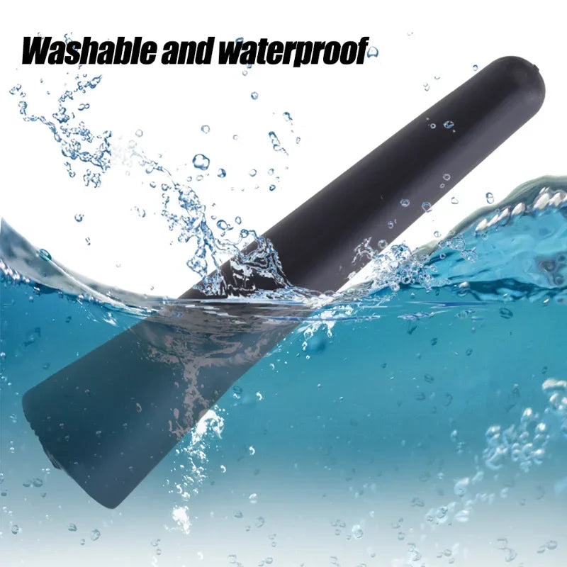 A black universal car roof antenna submerged in blue water, demonstrating its washable and waterproof features.