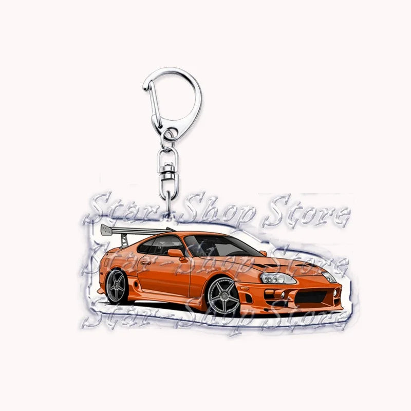 Acrylic keychain featuring an orange sports car model on a black background.