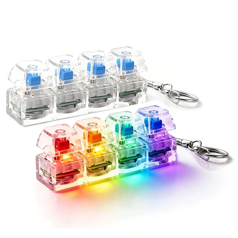 A collection of illuminated mechanical keyboard keychains in various colors and shapes, displayed on a white background.