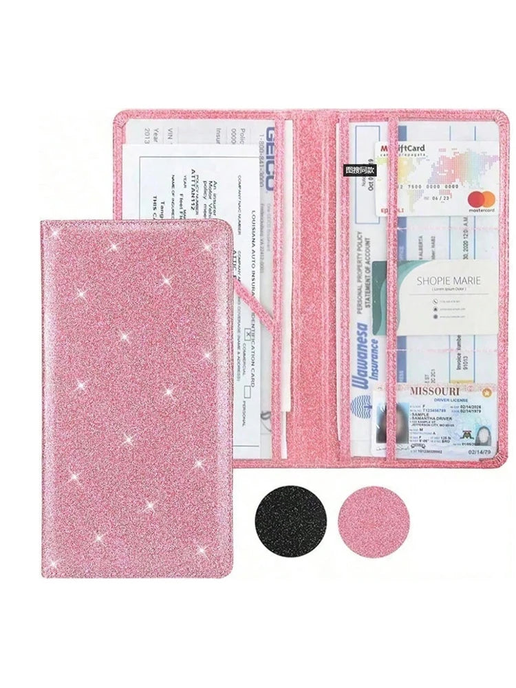 A pink glitter document holder featuring a car registration and insurance card inside.