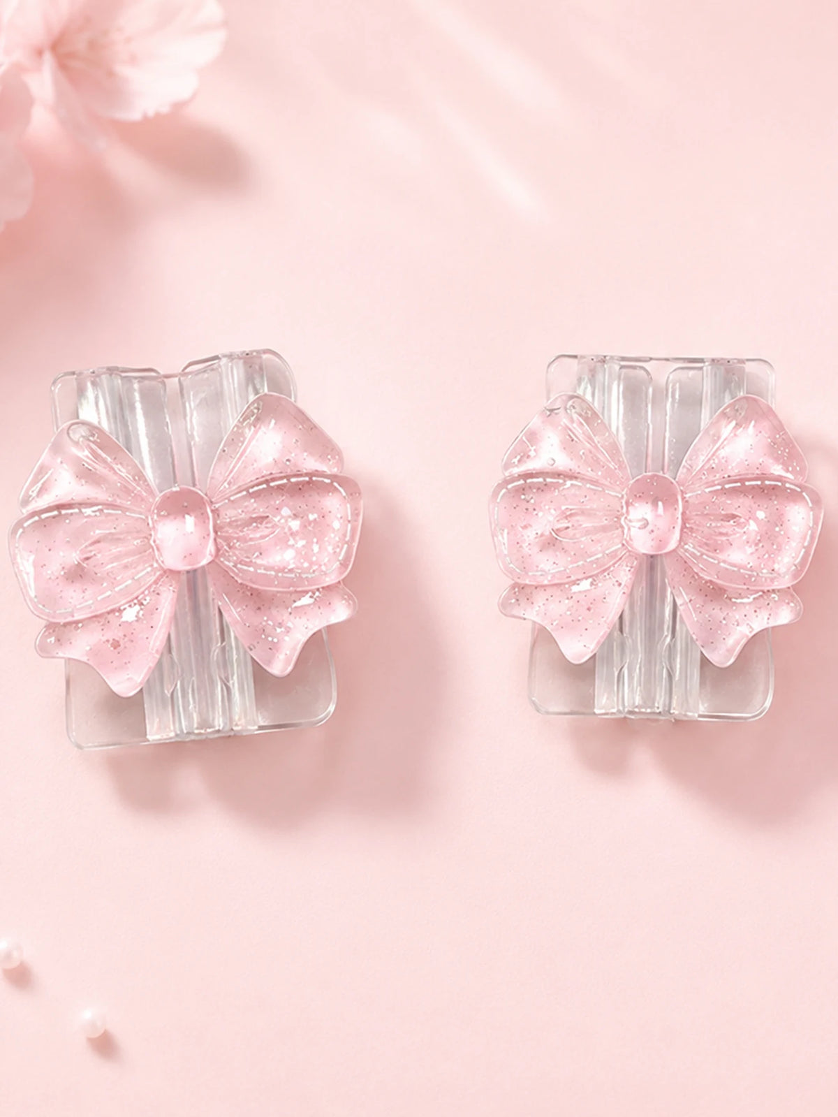 Pair of pink glitter bow cable protectors for lightning and type-c chargers