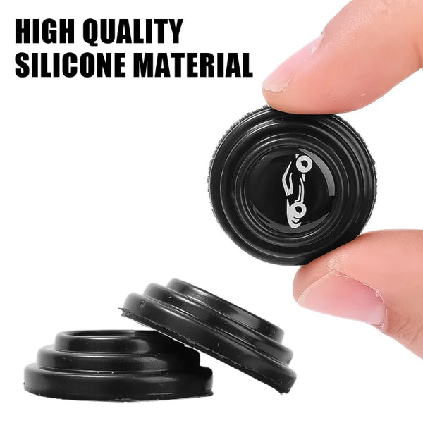 A hand holds a black silicone car door shock absorber pad, showing its texture and shape.
