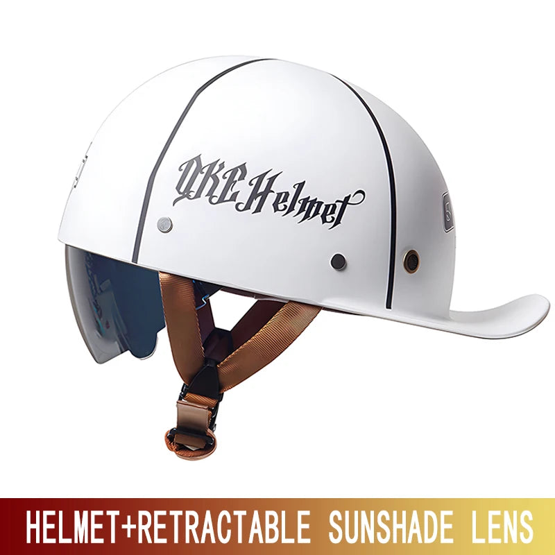 White retro half helmet with a retractable sunglass lens attached and a brown strap