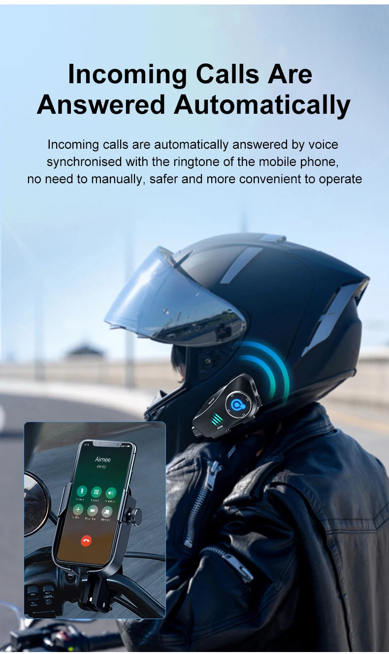 A person wearing a dark motorcycle helmet with an integrated device is shown against a blurred outdoor background.