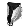 A heavy duty waterproof bicycle cover shown folded, featuring black and silver fabric.