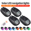 Four pairs of solar LED navigation lights and a remote control with various colored lights