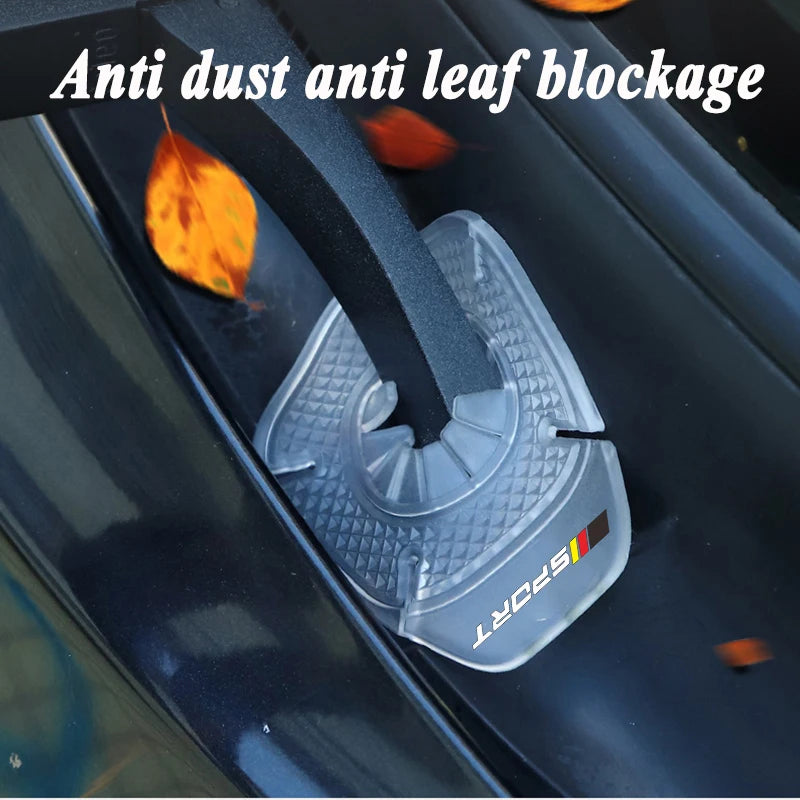 A clear plastic protective cover for a windshield wiper blade, designed to prevent dust and leaf blockage.