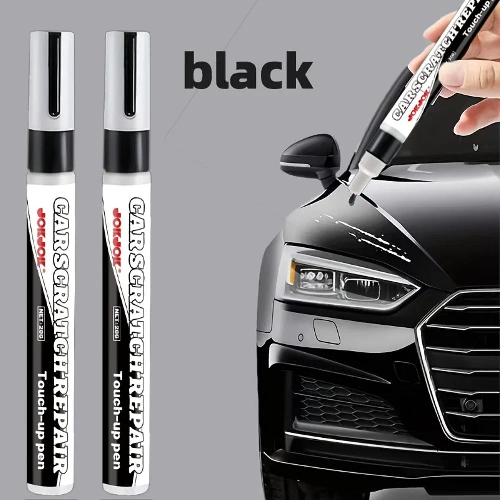 A black precision car touch-up pen is shown being used to repair scratches on a car's headlight.