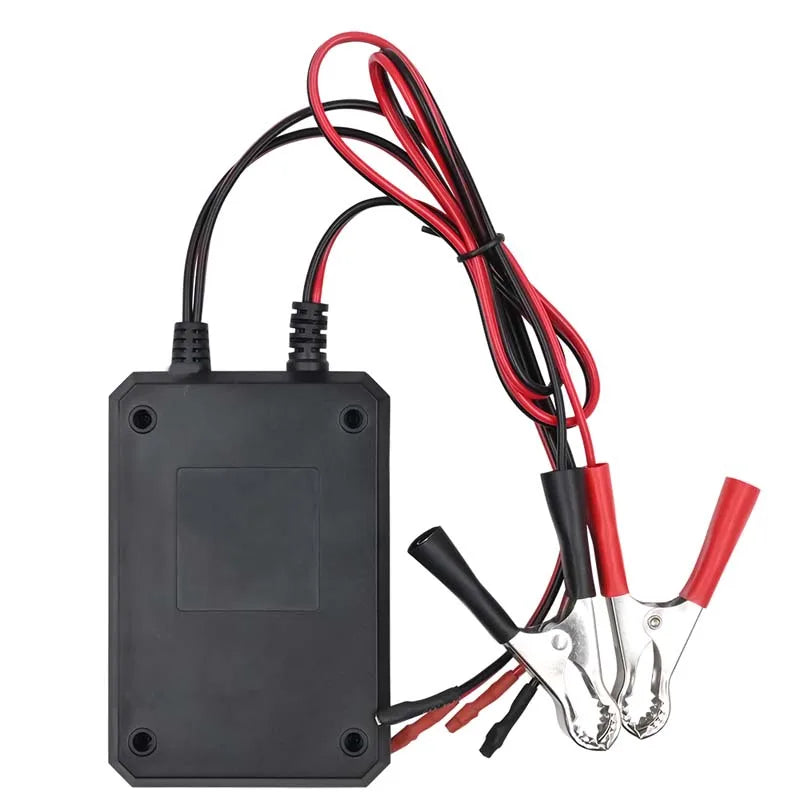 A black fuel injector tester and cleaner device with multiple wires and probes.