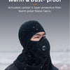 A man wearing a black built-in filter warm and dust-proof fleece balaclava in an outdoor setting.