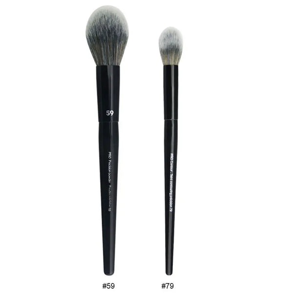 A set of black makeup brushes, including a large powder brush and a smaller blending brush.