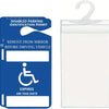A blue disabled parking identification permit card with instructions and an expiration date, next to a clear plastic sleeve.