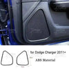 Carbon fiber mesh trim piece for Dodge Charger interior door panel.