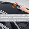 A hand is removing an emergency LED strobe light from the roof of a car, demonstrating how to drag it horizontally.