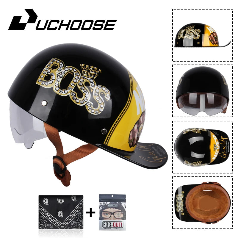 A black motorcycle helmet featuring a gold Boss logo and vintage open-face style, shown with related accessories.