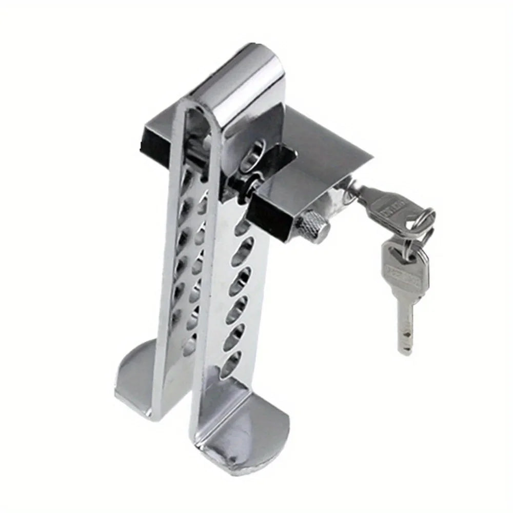 Stainless steel brake pedal clutch lock mechanism with a key and lever.