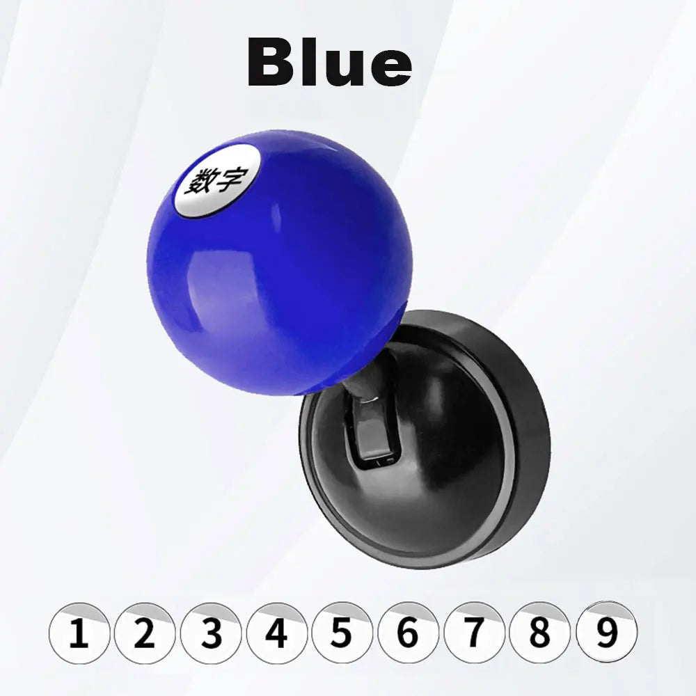 A blue car start button cover with a white lucky number sticker on top.
