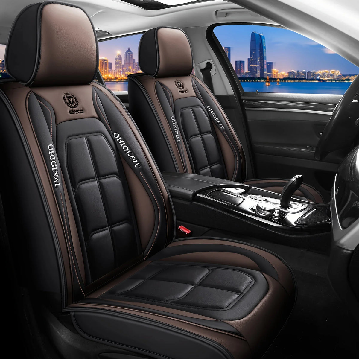 Interior view of a car with brown leather seat covers and a steering wheel.