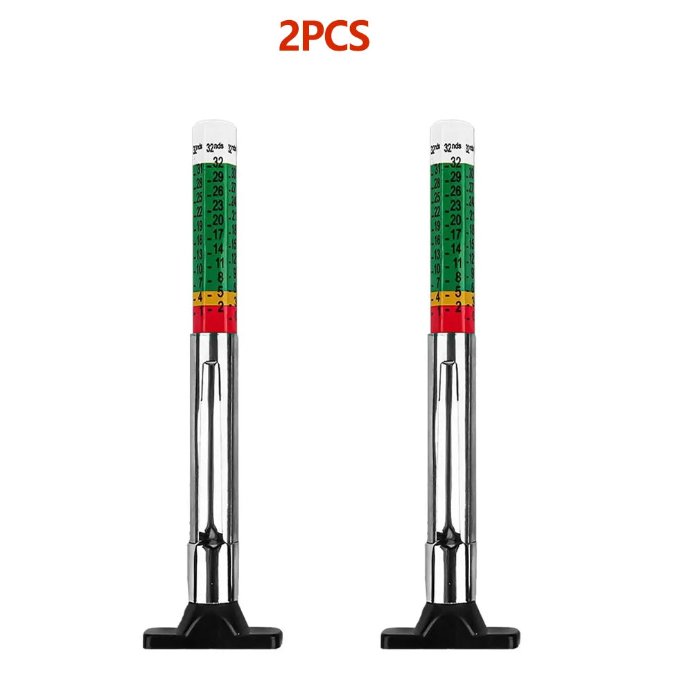 Two precision tire tread depth gauges with color-coded markings and metal bases