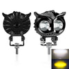 A pair of black LED automotive spotlights with a cat-like design and mounting brackets.