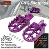 Purple heavy-duty CNC foot pegs for Sur-Ron, Talaria Sting, and Honda CRF230F motorcycles
