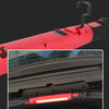 A red magnetic hook design work light is shown attached to a car interior surface.