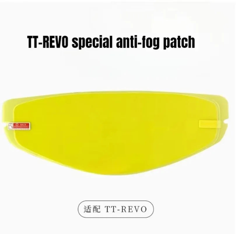 A yellow anti-fog patch for a motorcycle helmet visor, labeled TT-REVO special anti-fog patch.