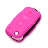 A pink silicone car key cover for Volkswagen models with three buttons and a silver metal frame.