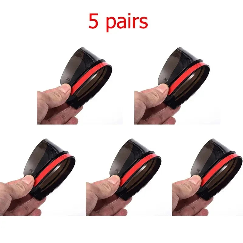 Five pairs of black carbon fiber car rain visors shown being held by a hand.