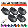 A set of eight multi-colored solar LED navigation lights in a four-pack with a remote control and additional individual light