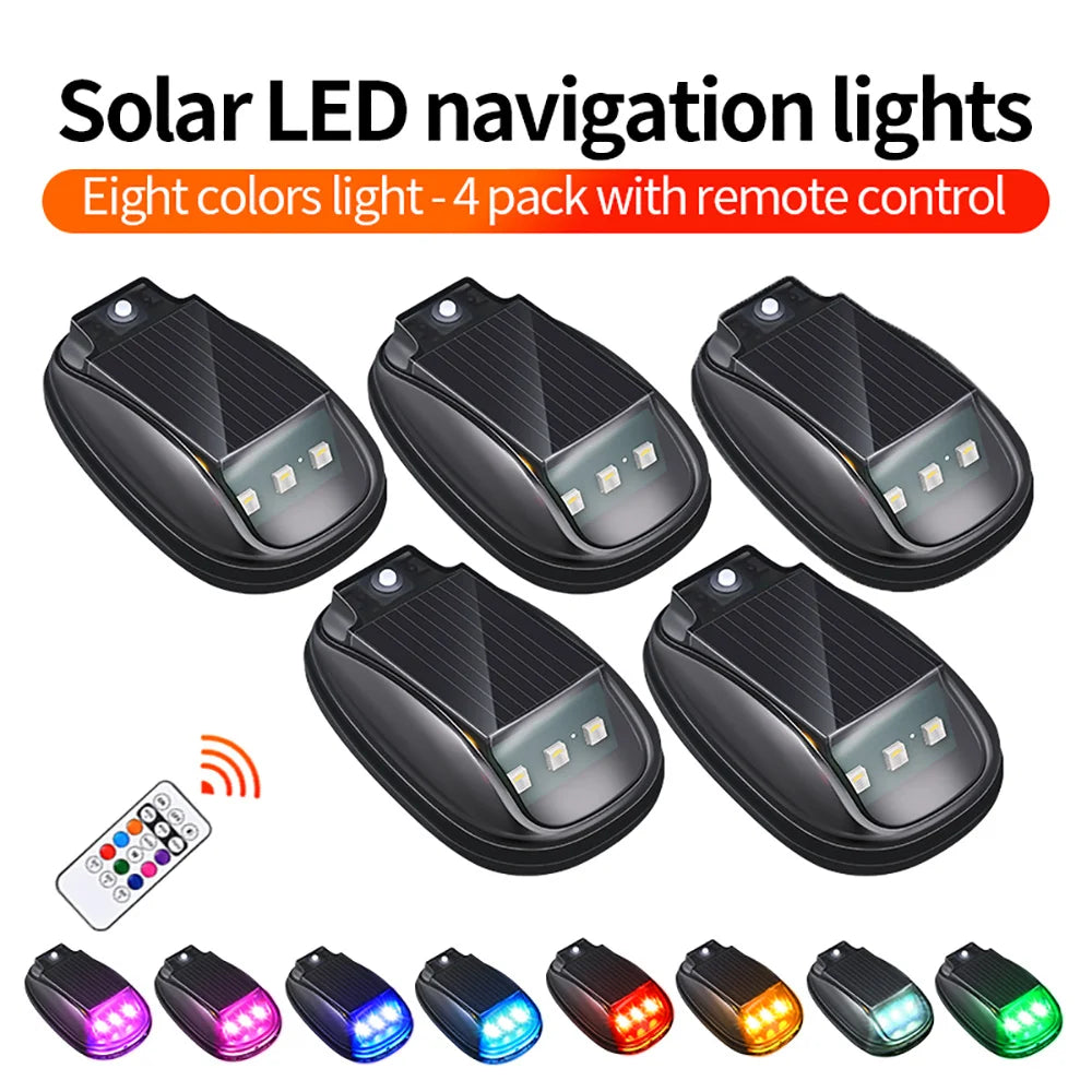 A set of eight multi-colored solar LED navigation lights in a four-pack with a remote control and additional individual light